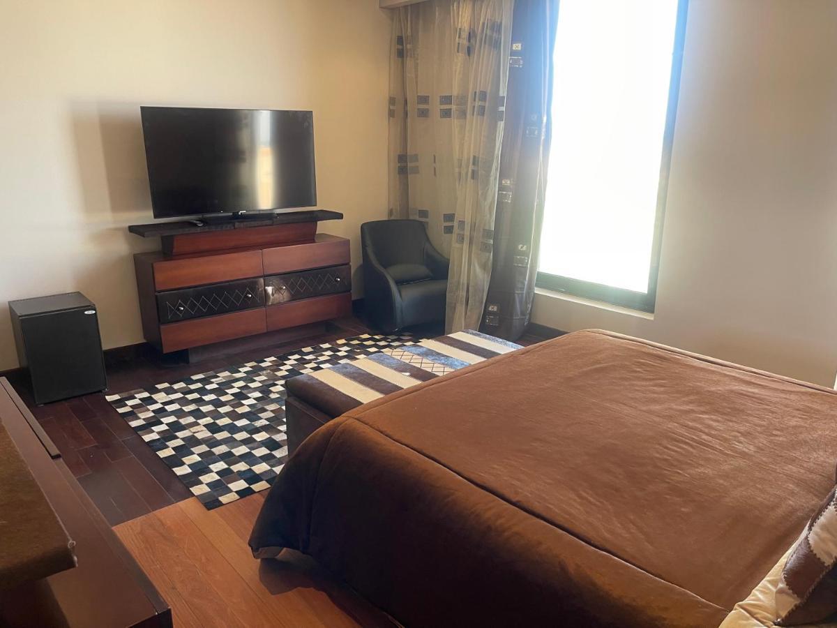 Pickalbatros Oasis Port Ghalib Hotel Exterior photo A typical bedroom in a hotel